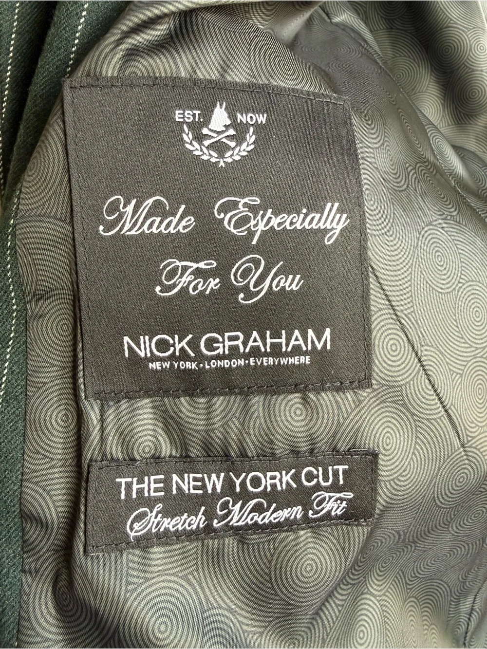 Nick Graham green pinstripe suit blazer